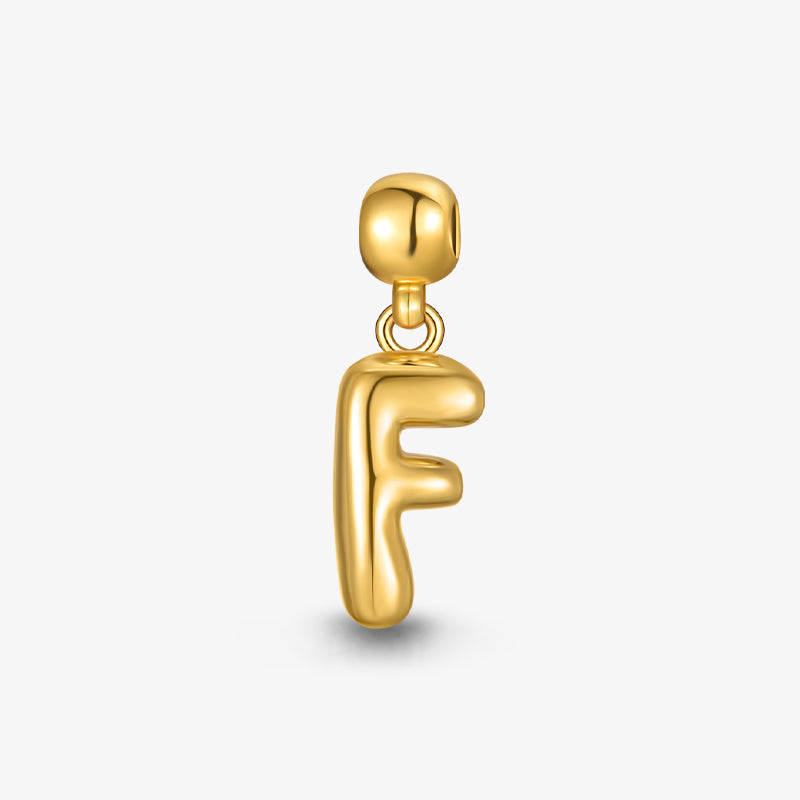 gold-plated letter F pendant charm on white background, elegant jewelry accessory