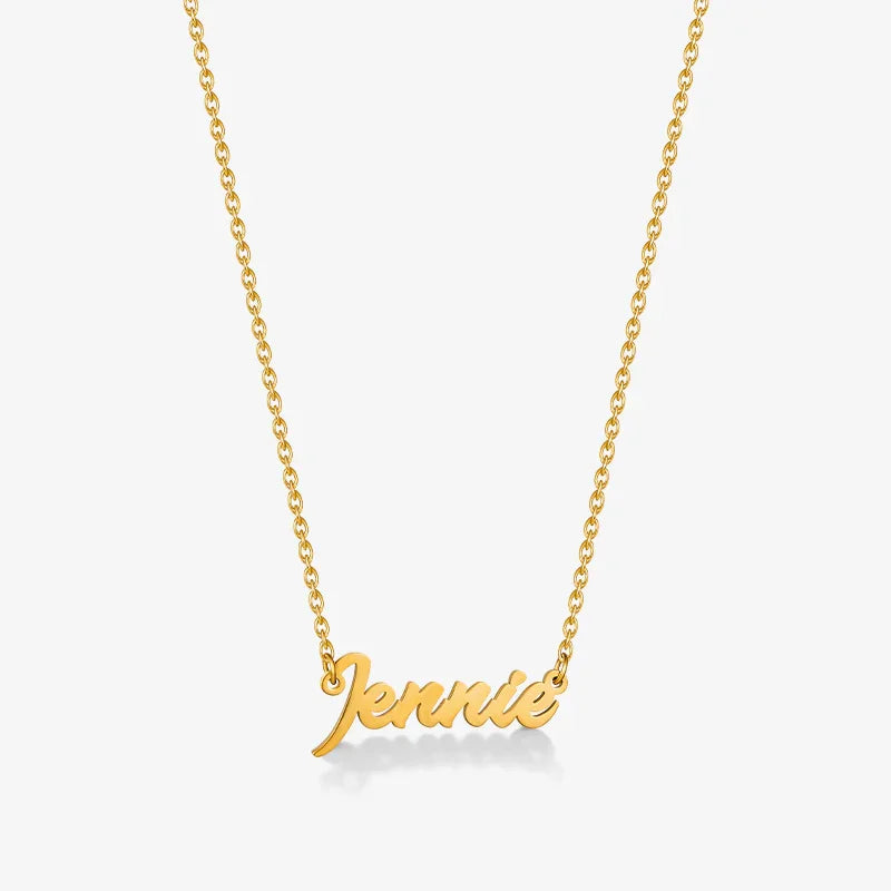 Gold-plated name necklace with script 'Jennie' on a delicate chain, minimalist jewelry