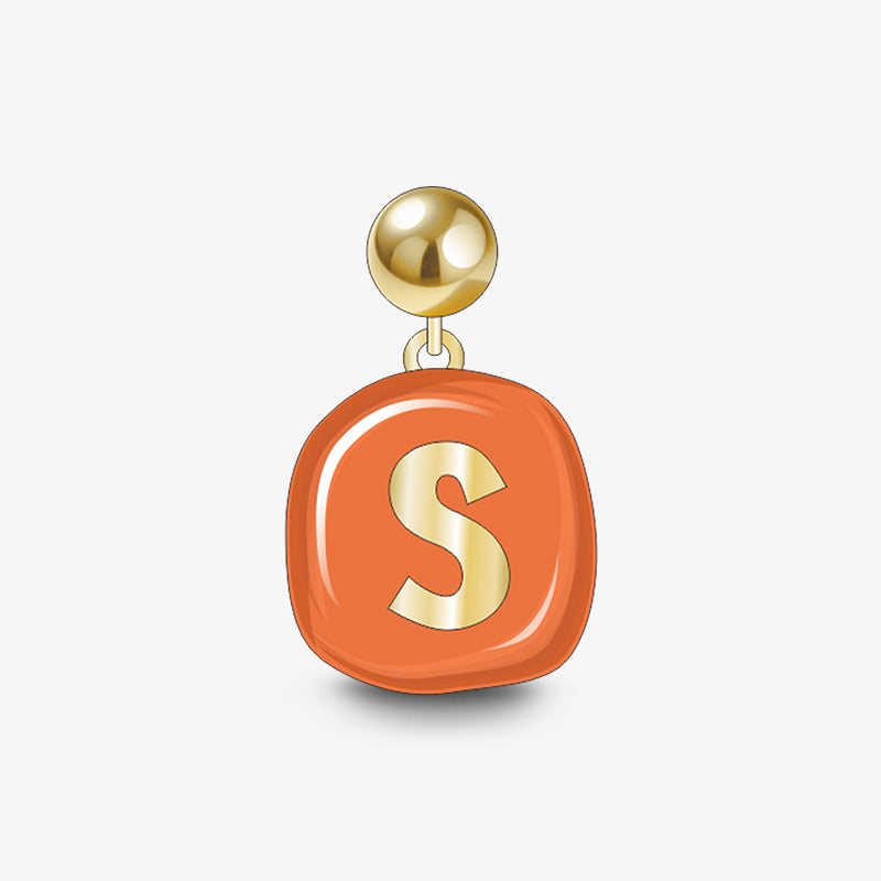 Gold-plated initial S orange enamel drop earring on white background