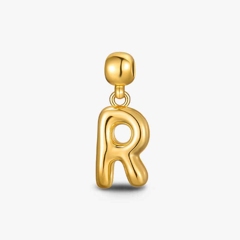 gold-plated letter R pendant charm for necklaces and bracelets on white background