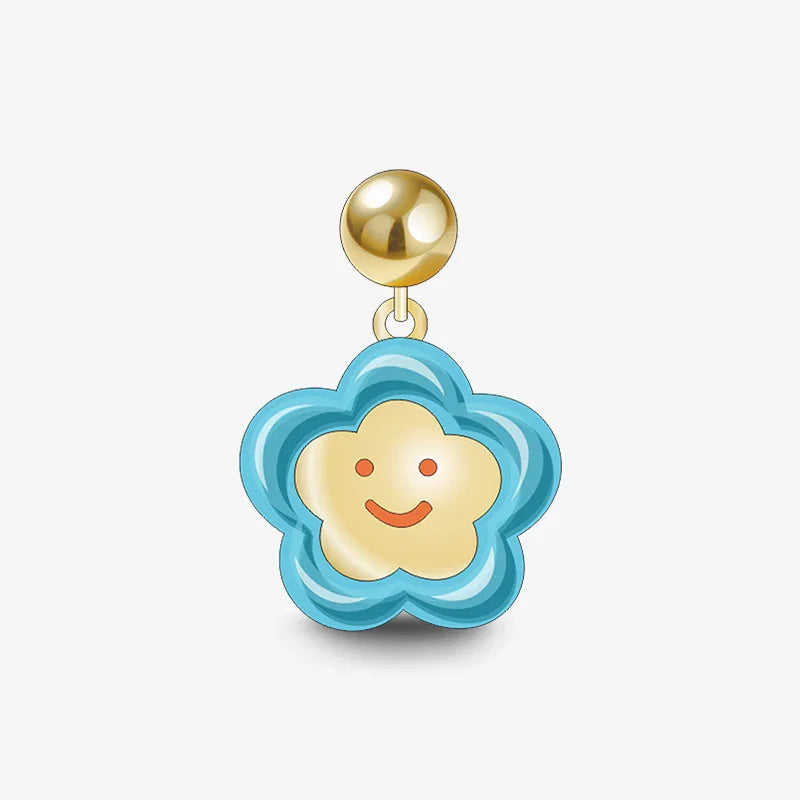 Gold-plated earring with blue flower-shaped pendant and smiley face design