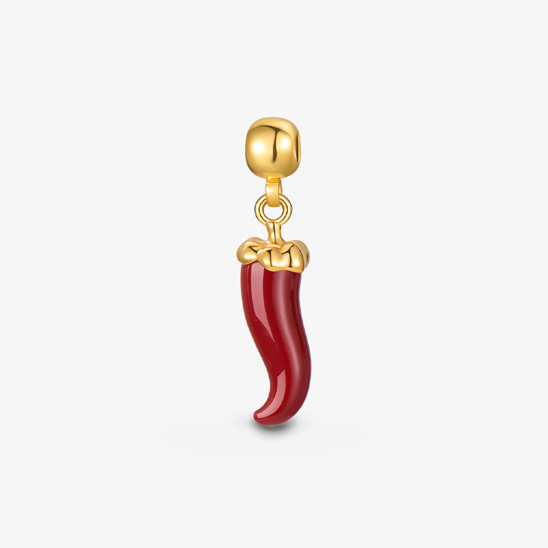 Gold-plated red chili pepper charm pendant with polished finish on white background