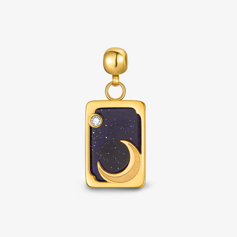 Gold-plated rectangular pendant with crescent moon and star detail on navy background