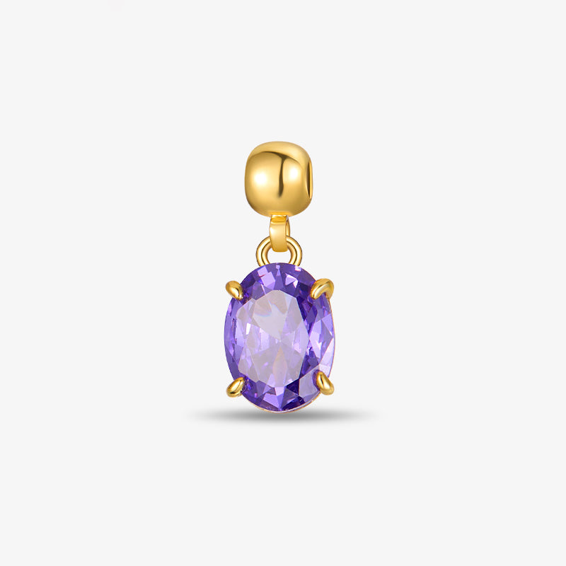 Gold-plated earring with oval purple gemstone on white background