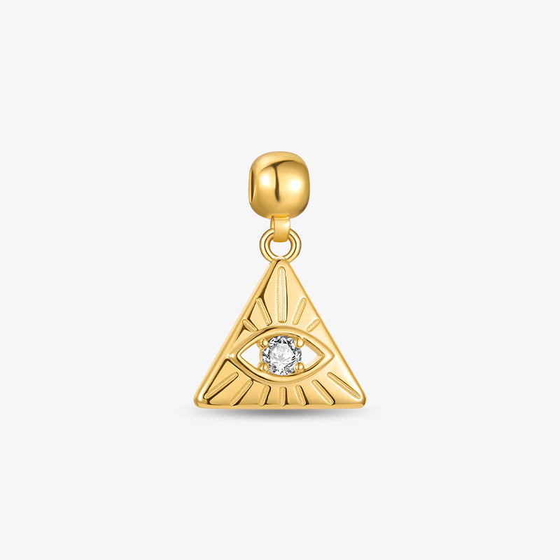 Gold-plated triangle pendant with eye design and central clear gemstone on white background