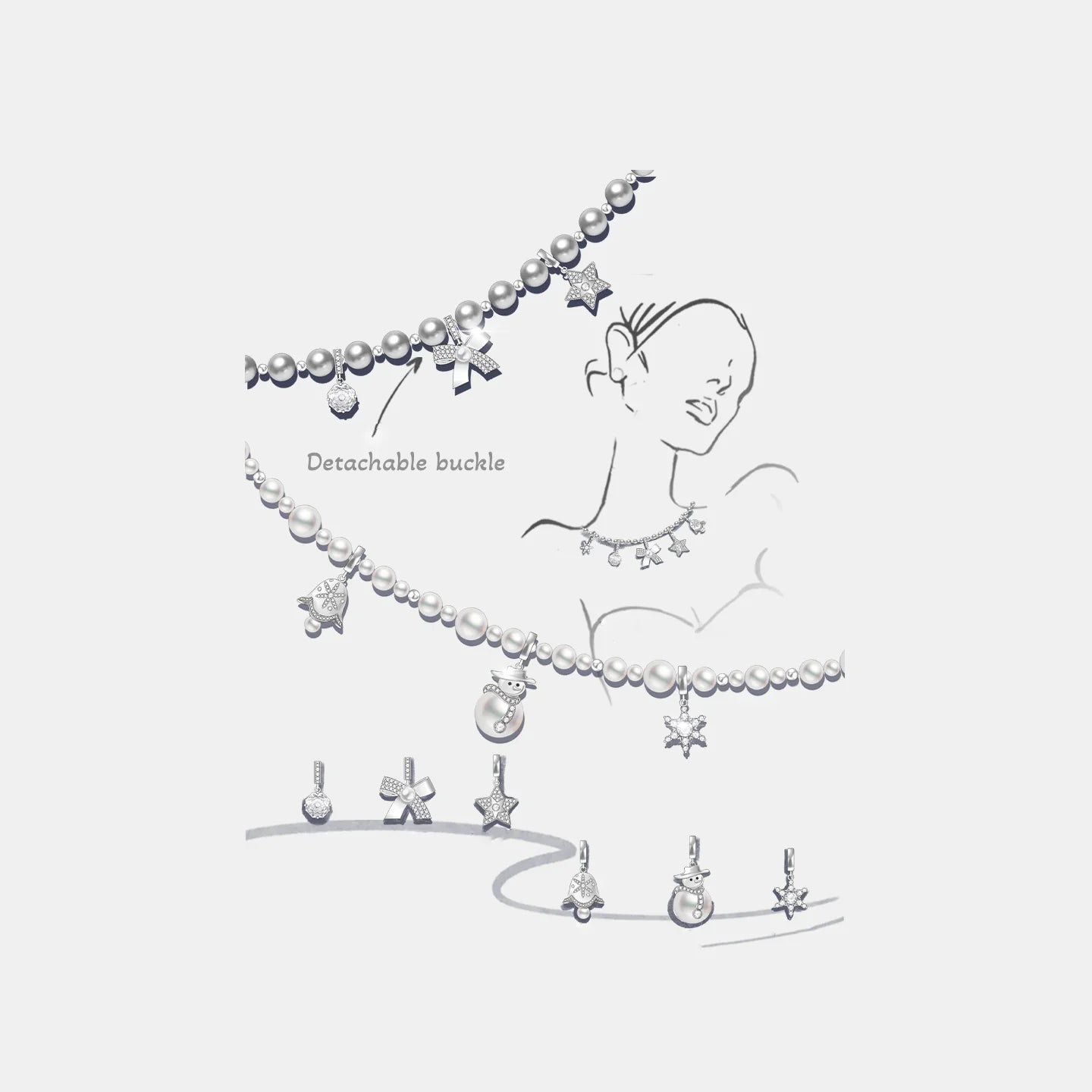 Pearl necklace with detachable silver charms including star, snowman, bow, and crystal pendants.